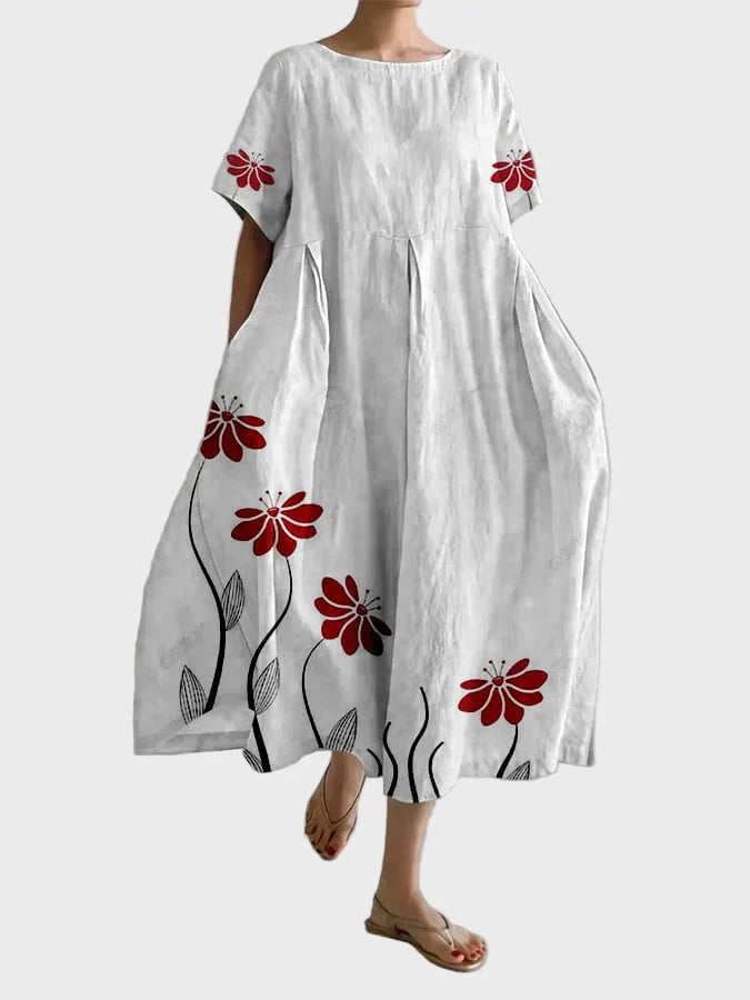 Weisses Kleid mit roten Blütenzweigen