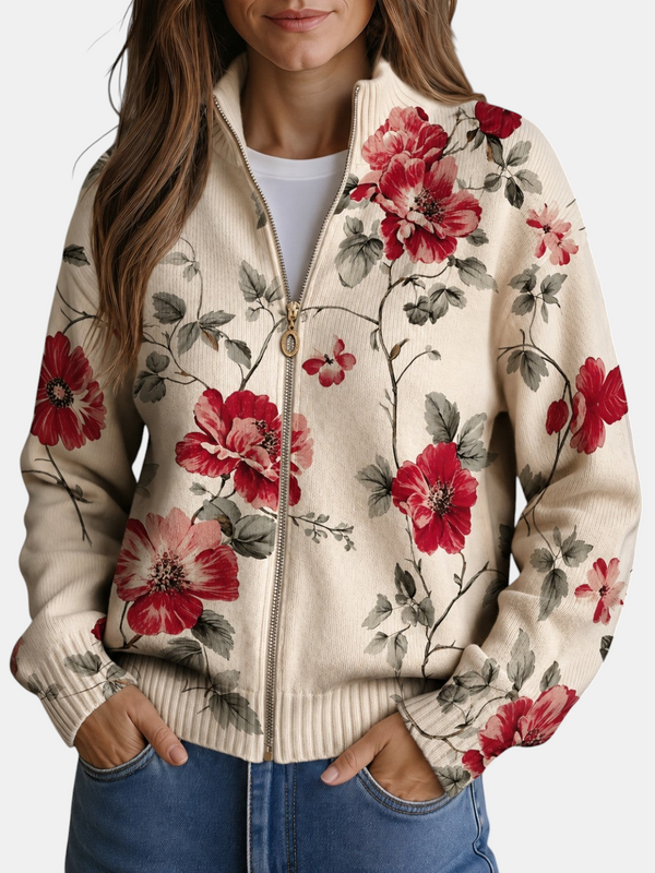 Cardigan Emma Genève Yolanda crème en maille avec imprimé floral de roses rouges et roses, coupe bomber zippée.