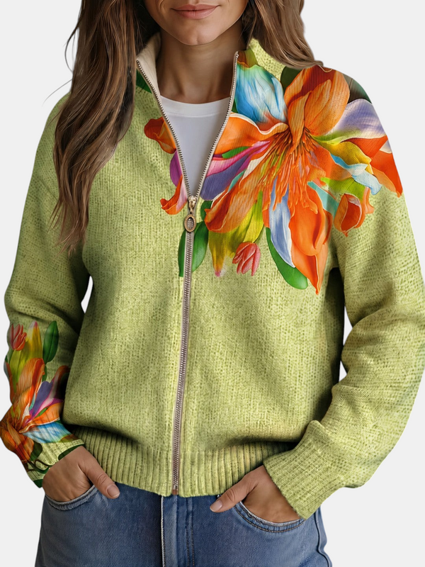 Cardigan Emma Genève em malha verde claro com estampado floral de lírios coloridos e fecho de correr frontal